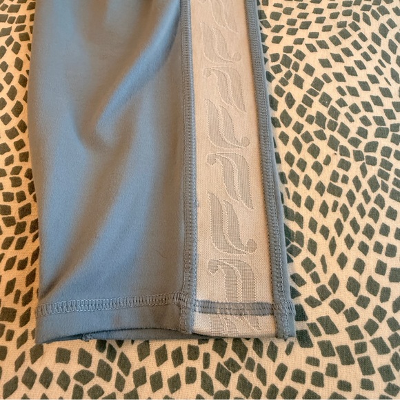 Fabletics | Blue Leggings with Signature Reflective White Side Stripe - Picture 4 of 9